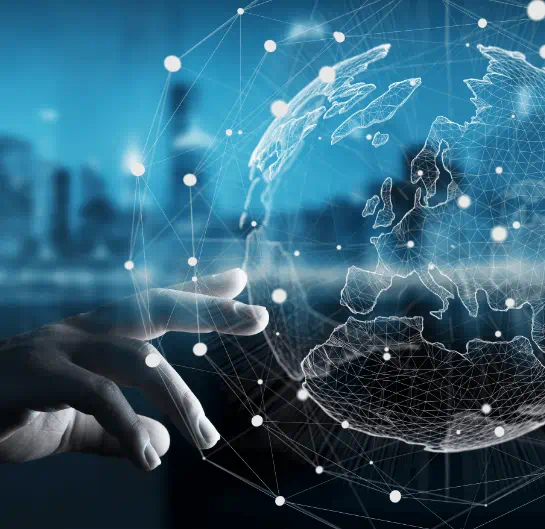 Hand touching a 3D globe model showcasing the worldwide audience of Citeline Connect HCP Awareness.